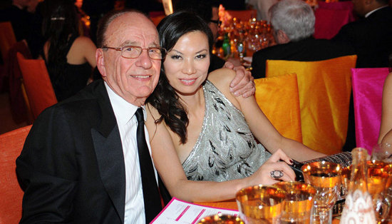 File photo of Rupert Murdoch, chairman and CEO of News Corporation, and his wife Wendi Deng. [Youth.cn]