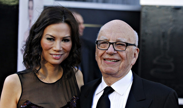 File photo of Rupert Murdoch, chairman and CEO of News Corporation, and his wife Wendi Deng. [Youth.cn]